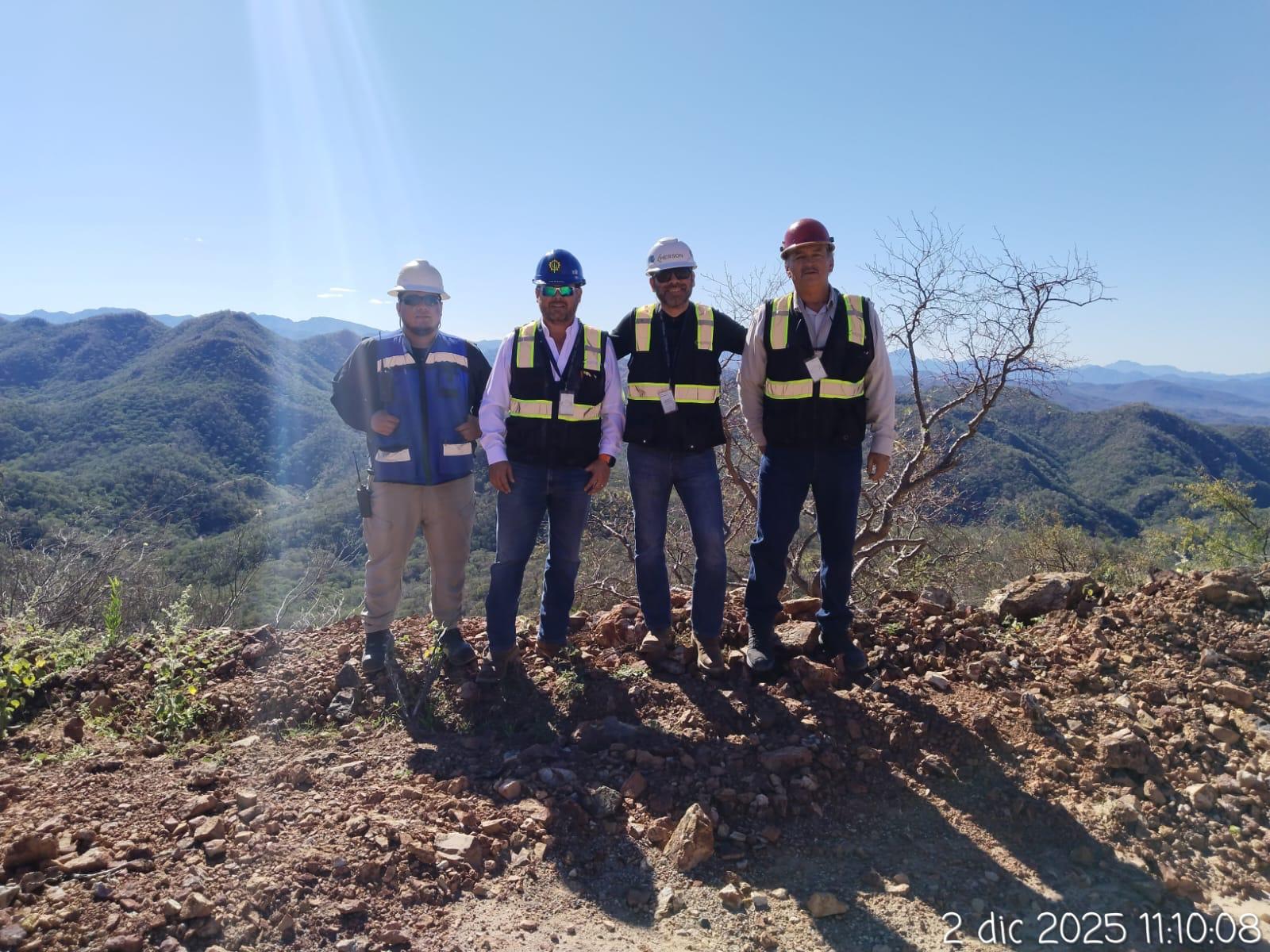 Site inspection team on hilltop