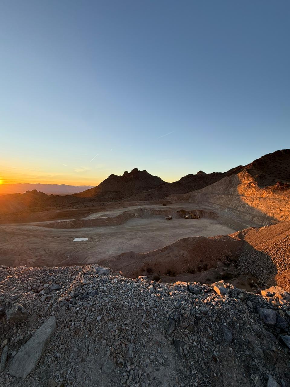 Open-pit mine at sunset