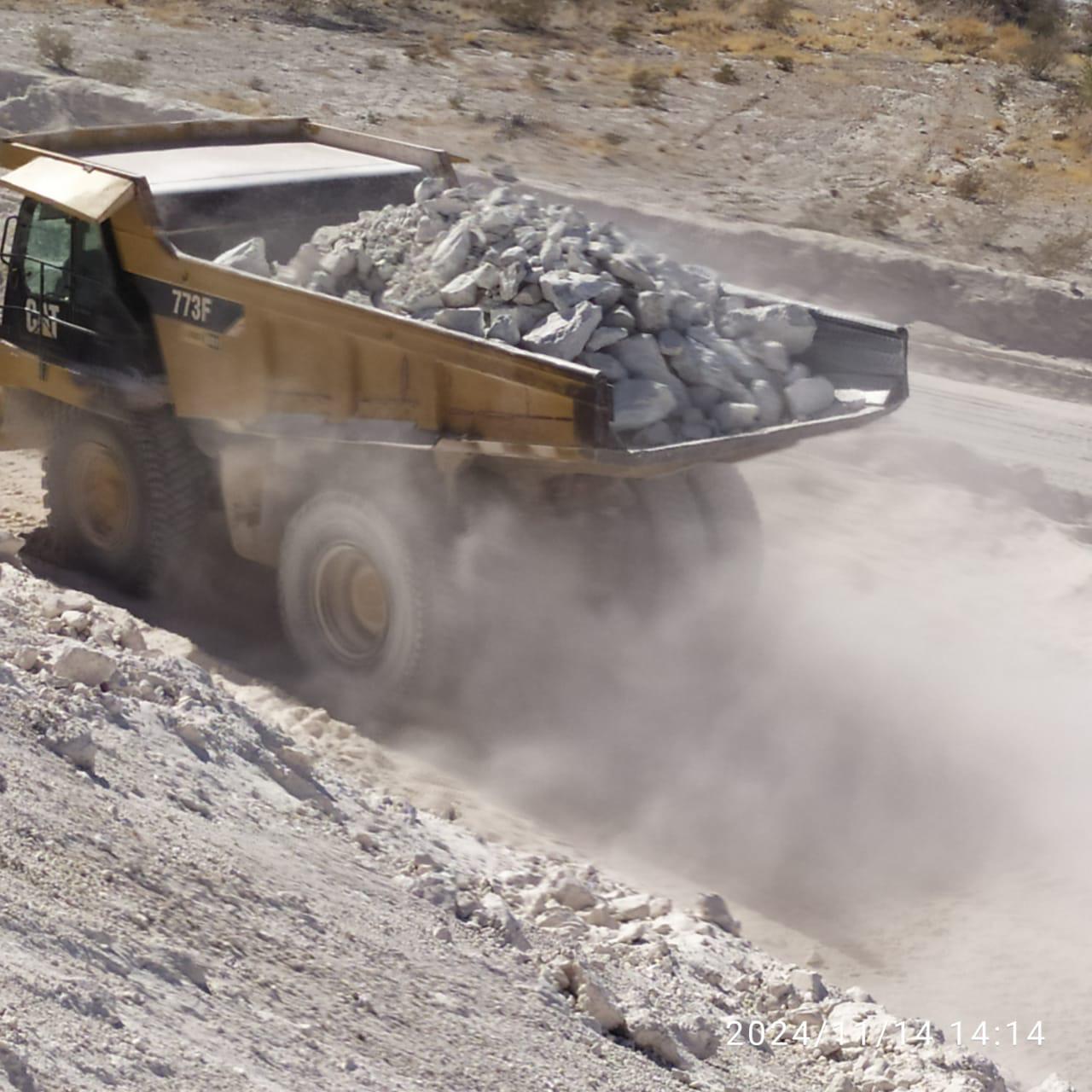 Dump truck hauling rock